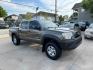 2012 Brown /Silver Toyota Tacoma SR5 (5TFJU4GN5CX) with an 4.0L engine, Automatic transmission, located at 1501 West 15th St., Houston, 77008, (713) 869-2925, 29.797941, -95.411789 - Photo#1